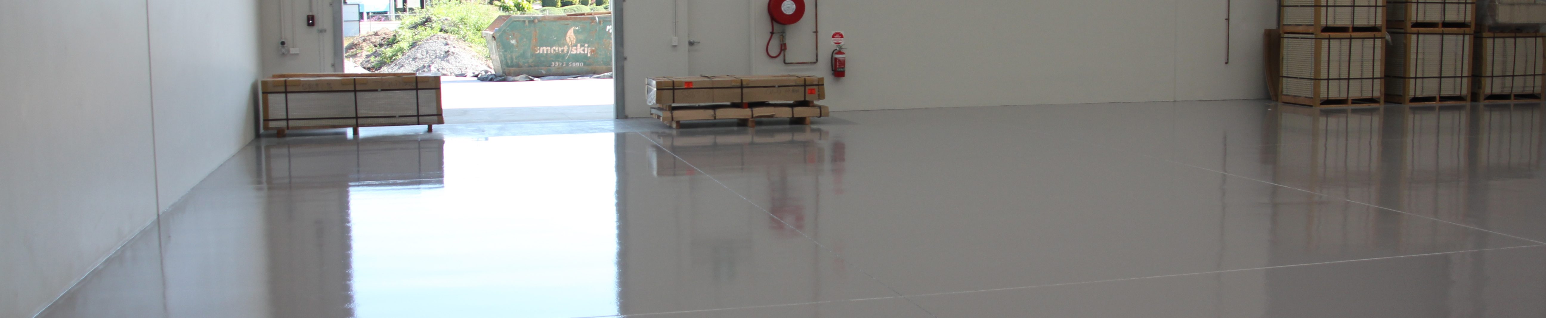 A new, glossy thin-film rollcoat system in a commercial warehouse.
